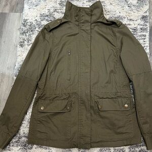 Woman’s olive green utility jacket